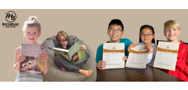 Children hold their Language Lessons for a Living Education and Writing Strands books