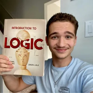 Master Books student showing off Introduction to Logic Homeschool Curriculum