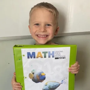 Student proud of the accomplishments made in Master Books' Math Lessons Homeschool Curriculum